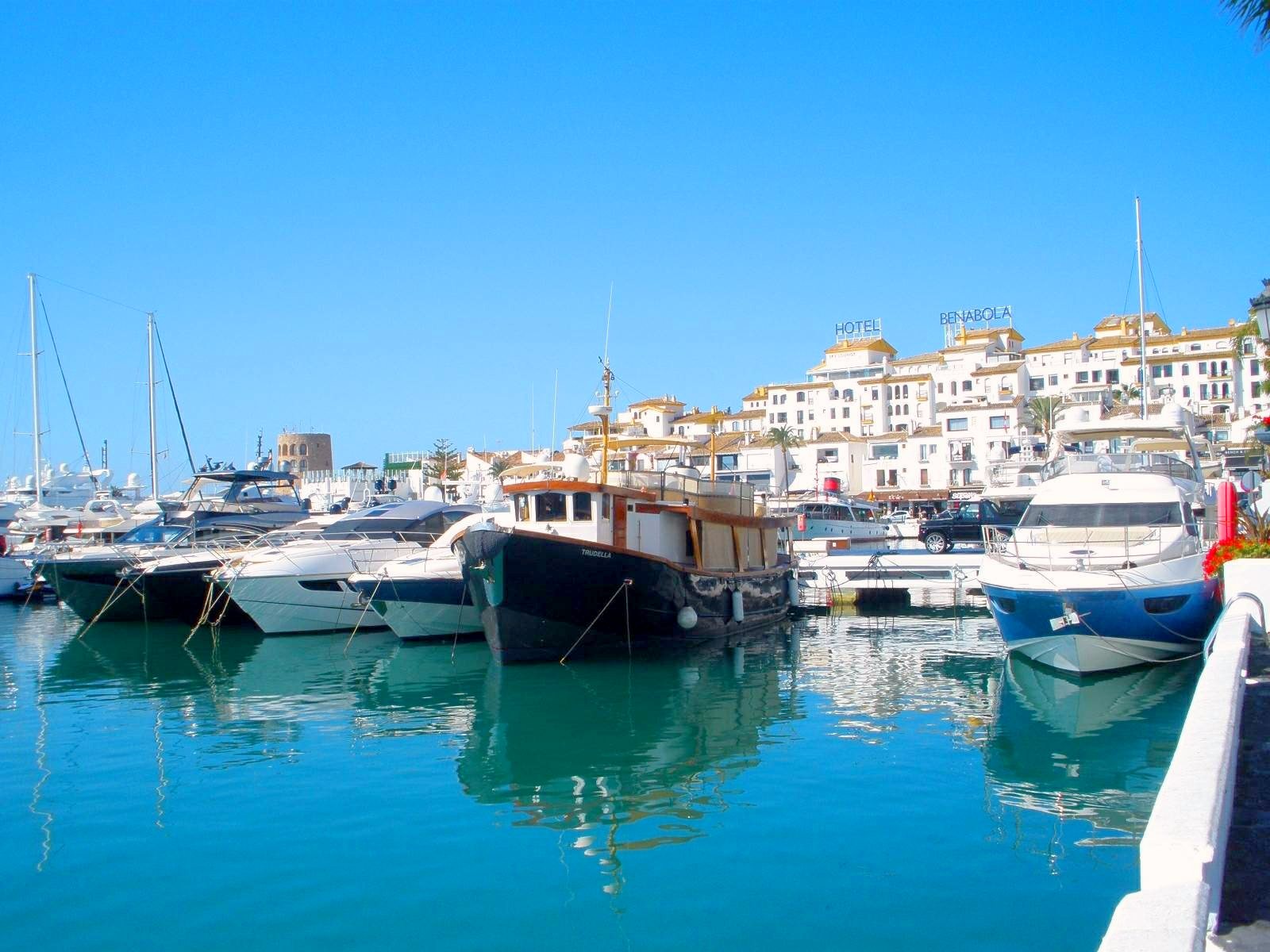 Yachts and the white port in the sunshine